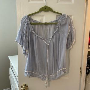 Blue and white striped off-the-shoulder blouse